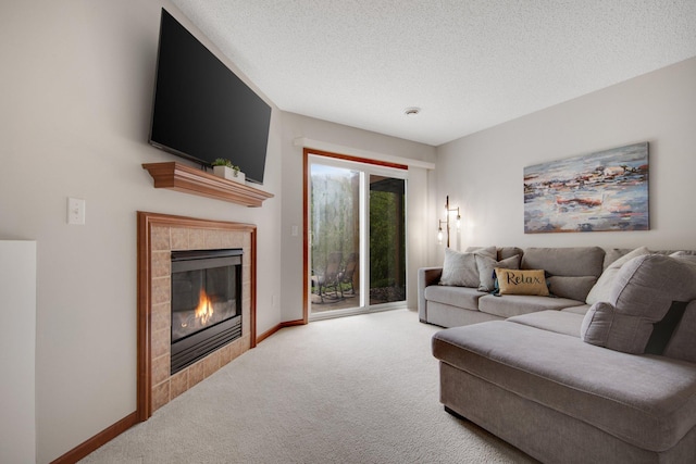 5133 Farnham Dr N, Hugo, MN 55038 - living area featuring carpet, a fireplace, a textured ceiling, and baseboards