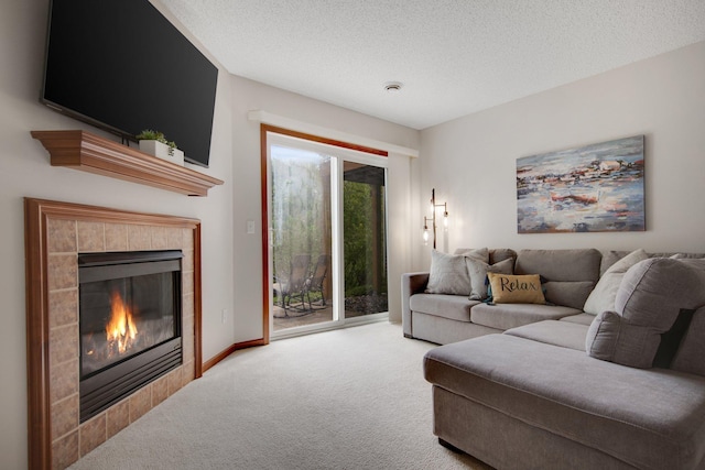 5133 Farnham Dr N, Hugo, MN 55038 - carpeted living area featuring a tile fireplace, a textured ceiling, and baseboards