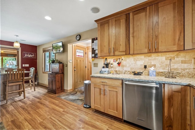 2511 Carver Ave E, Maplewood, MN 55119 - kitchen featuring dishwasher, light wood-style flooring, decorative backsplash, light stone counters, and recessed lighting