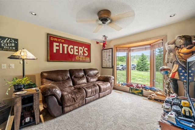 2511 Carver Ave E, Maplewood, MN 55119 - living room featuring ceiling fan and carpet