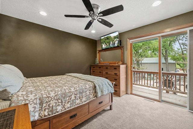 2511 Carver Ave E, Maplewood, MN 55119 - carpeted bedroom with access to outside, recessed lighting, and ceiling fan