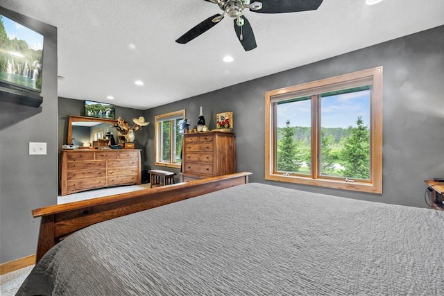2511 Carver Ave E, Maplewood, MN 55119 - bedroom with recessed lighting, ceiling fan, and baseboards