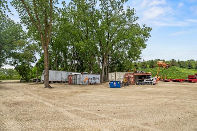 2511 Carver Ave E, Maplewood, MN 55119 - view of yard featuring mail area and view of wooded area