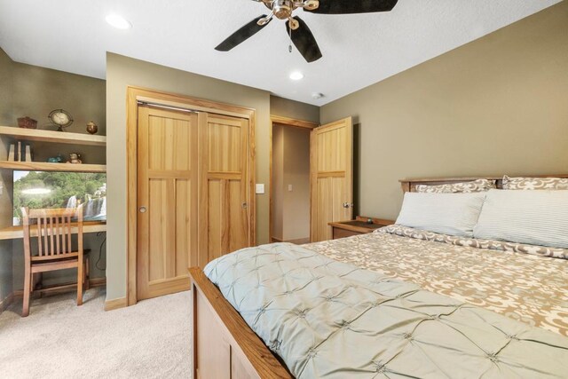 2511 Carver Ave E, Maplewood, MN 55119 - bedroom featuring light carpet, a closet, a ceiling fan, baseboards, and recessed lighting