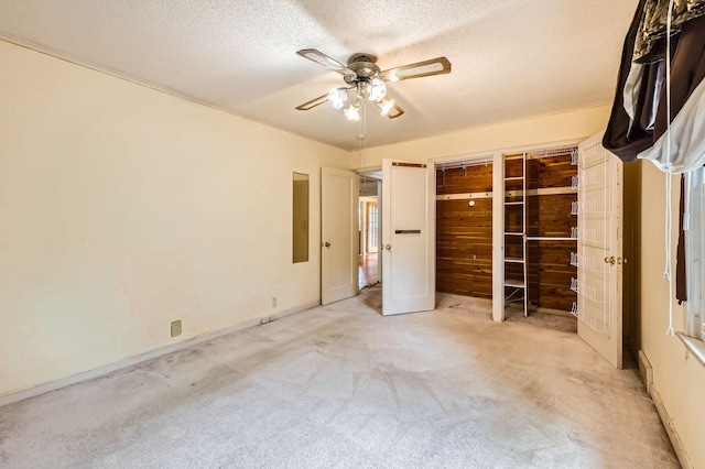 7029 Augsburg Ave S, Richfield, MN 55423 - unfurnished bedroom with carpet, a textured ceiling, ceiling fan, and electric panel