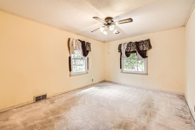 7029 Augsburg Ave S, Richfield, MN 55423 - unfurnished room featuring a ceiling fan, carpet flooring, and a textured ceiling