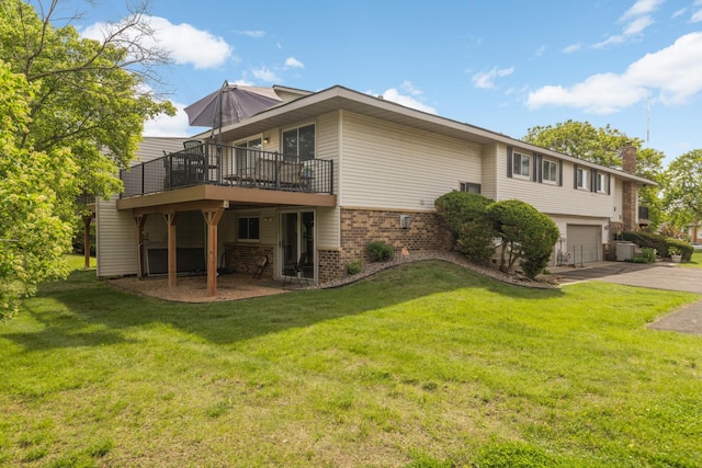 4119 Sylvia Ln S, Shoreview, MN 55126 - rear view of property featuring brick siding, a wooden deck, a garage, asphalt driveway, and a chimney