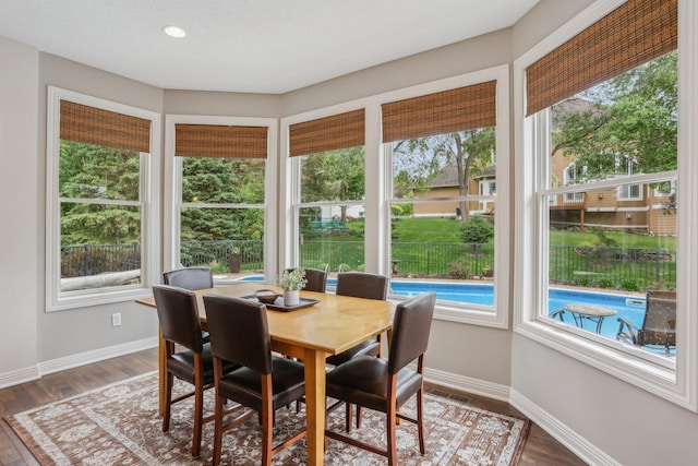 11560 Ashley Ct, Inver Grove Heights, MN 55077 - dining area featuring healthy amount of natural light, baseboards, wood finished floors, and recessed lighting