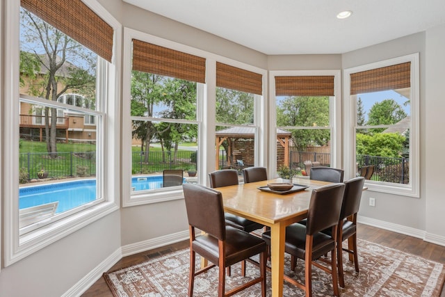 11560 Ashley Ct, Inver Grove Heights, MN 55077 - dining area with baseboards, dark wood finished floors, and recessed lighting