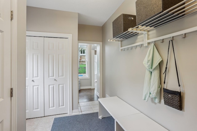 11560 Ashley Ct, Inver Grove Heights, MN 55077 - mudroom featuring light tile patterned floors and baseboards