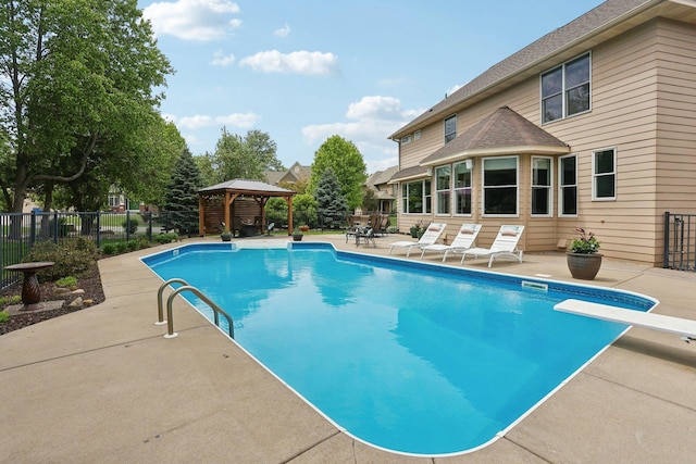 11560 Ashley Ct, Inver Grove Heights, MN 55077 - view of swimming pool with a gazebo, a patio area, and a diving board