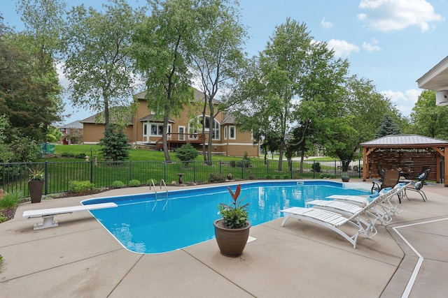 11560 Ashley Ct, Inver Grove Heights, MN 55077 - view of pool featuring a gazebo, a diving board, and a patio area