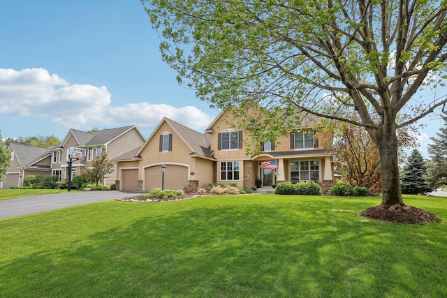 11560 Ashley Ct, Inver Grove Heights, MN 55077 - view of front facade featuring stucco siding, driveway, a front lawn, and a garage