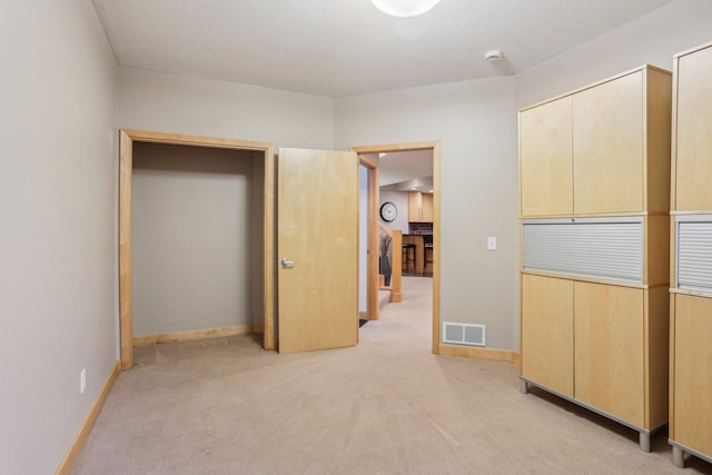 11560 Ashley Ct, Eagan, MN 55077 - unfurnished bedroom with light colored carpet and baseboards