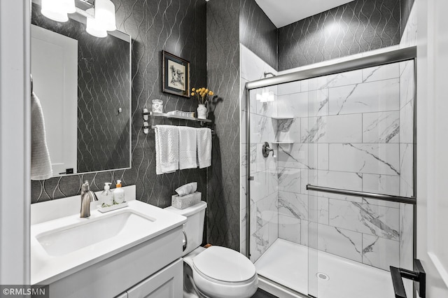 7023 61st St S, Cottage Grove, MN 55016 - full bathroom featuring a shower stall, toilet, vanity, and tile walls