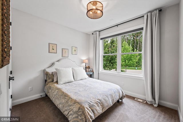 7023 61st St S, Cottage Grove, MN 55016 - bedroom featuring carpet floors and baseboards