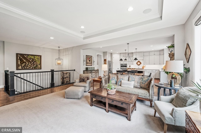 7023 61st St S, Cottage Grove, MN 55016 - living area featuring recessed lighting, a tray ceiling, carpet, and crown molding