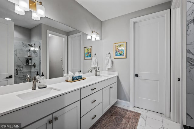 7023 61st St S, Cottage Grove, MN 55016 - bathroom with marble look tiles, double vanity, a marble finish shower, and baseboards