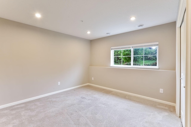 2189 Gateway Hill Rd N, Saint Paul, MN 55109 - spare room with light carpet, baseboards, and recessed lighting