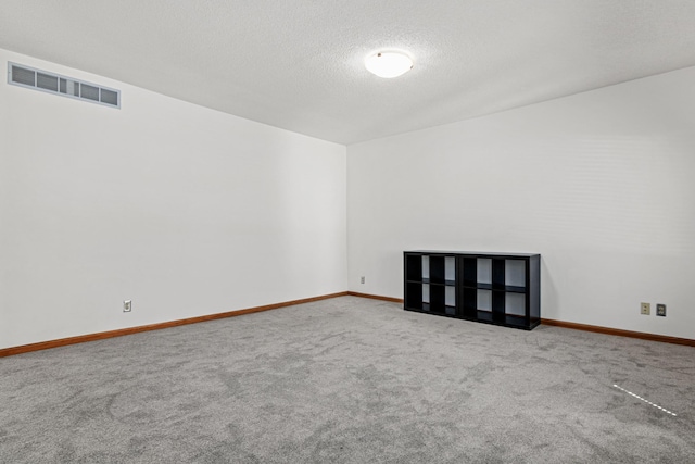 3372 Texas Ave S, Saint Louis Park, MN 55426 - unfurnished room featuring carpet floors, a textured ceiling, and baseboards