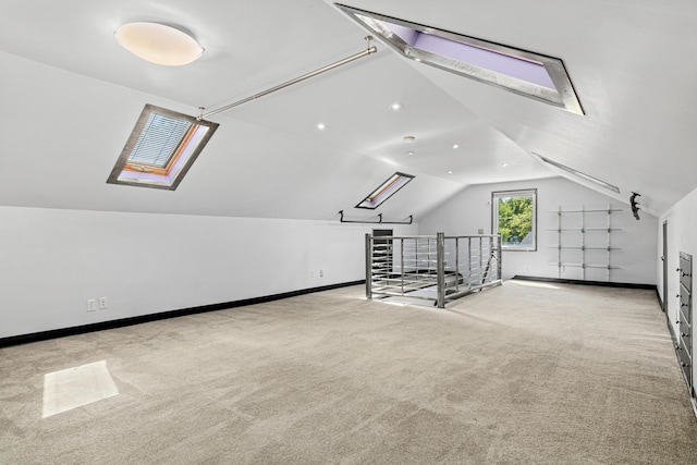 3372 Texas Ave S, Saint Louis Park, MN 55426 - additional living space featuring a skylight, carpet floors, vaulted ceiling, and baseboards