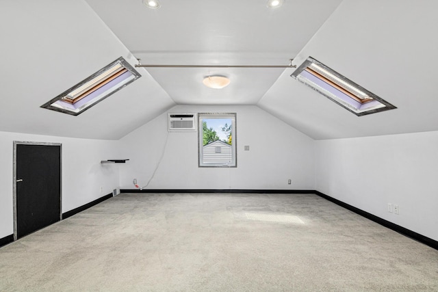 3372 Texas Ave S, Saint Louis Park, MN 55426 - additional living space with a skylight, carpet floors, baseboards, lofted ceiling, and recessed lighting