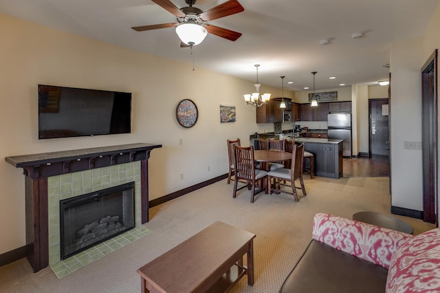 502 Cleveland Blvd W Unit 2400, Walker, MN 56484 - living room featuring light carpet, baseboards, a tile fireplace, a ceiling fan, and recessed lighting