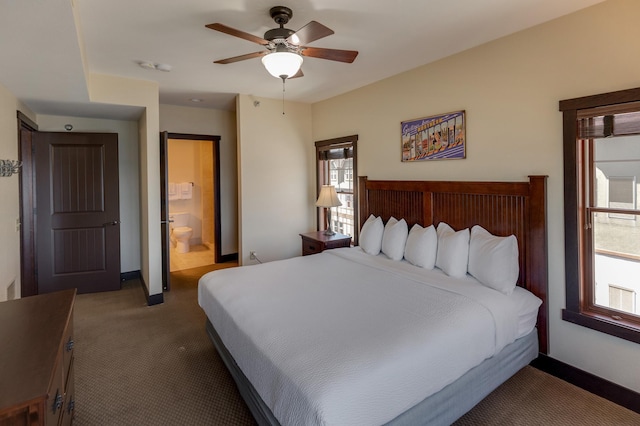 502 Cleveland Blvd W Unit 2400, Walker, MN 56484 - carpeted bedroom with baseboards, multiple windows, and ensuite bathroom