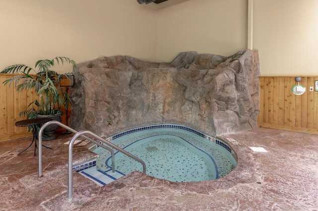 502 Cleveland Blvd W Unit 2400, Walker, MN 56484 - detailed view of a jacuzzi, wooden walls, and a wainscoted wall