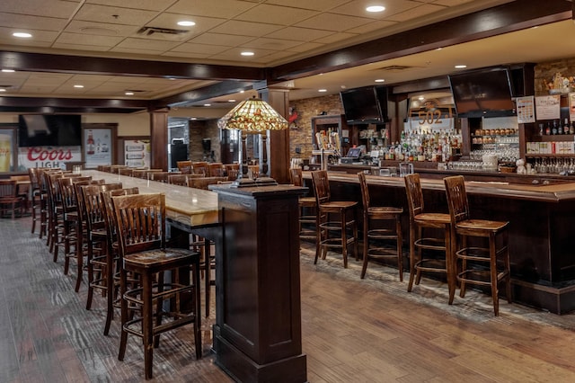 502 Cleveland Blvd W Unit 2400, Walker, MN 56484 - indoor dry bar featuring wood finished floors and a paneled ceiling