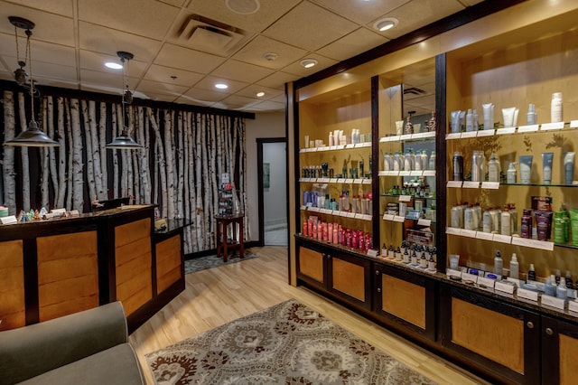 502 Cleveland Blvd W Unit 2400, Walker, MN 56484 - miscellaneous room with light wood-type flooring and a drop ceiling