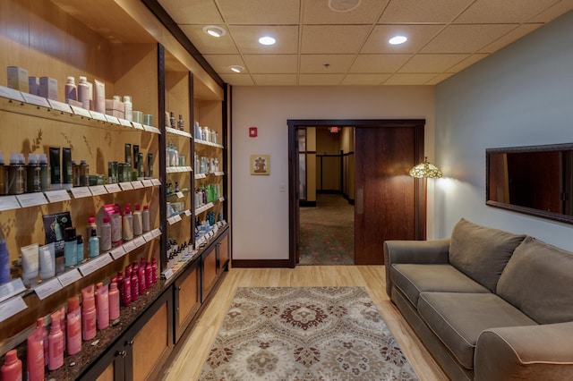 502 Cleveland Blvd W Unit 2400, Walker, MN 56484 - living area with light wood finished floors, a paneled ceiling, and recessed lighting