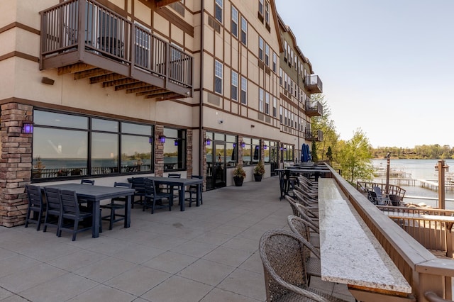 502 Cleveland Blvd W Unit 2400, Walker, MN 56484 - view of patio featuring a water view and a balcony