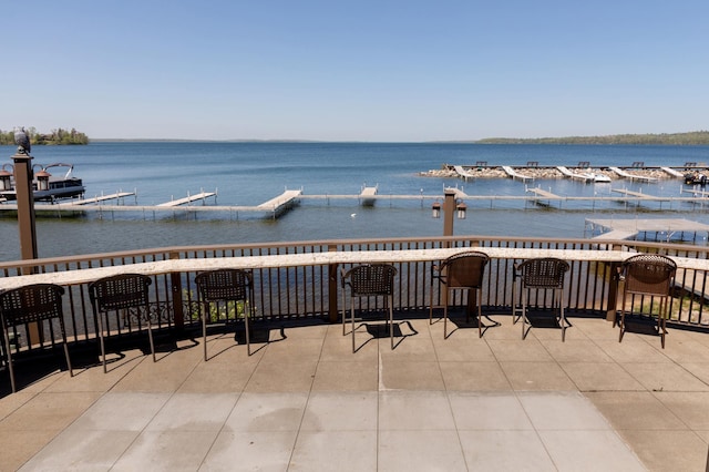 502 Cleveland Blvd W Unit 2400, Walker, MN 56484 - view of patio / terrace with a water view and a boat dock