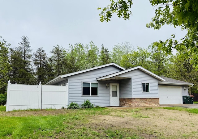 12658 Chestnut Dr, Baxter, MN 56425 - view of front facade featuring an attached garage and driveway