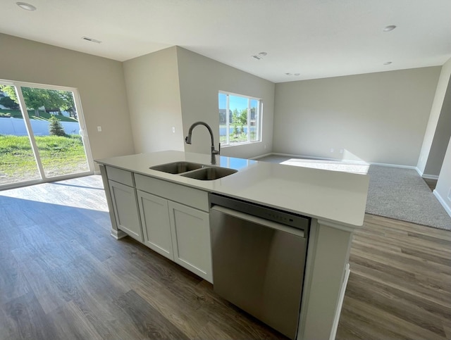 3228 Kady Ave NE, Saint Michael, MN 55376 - kitchen featuring dishwasher, a sink, dark wood-style floors, open floor plan, and a center island with sink