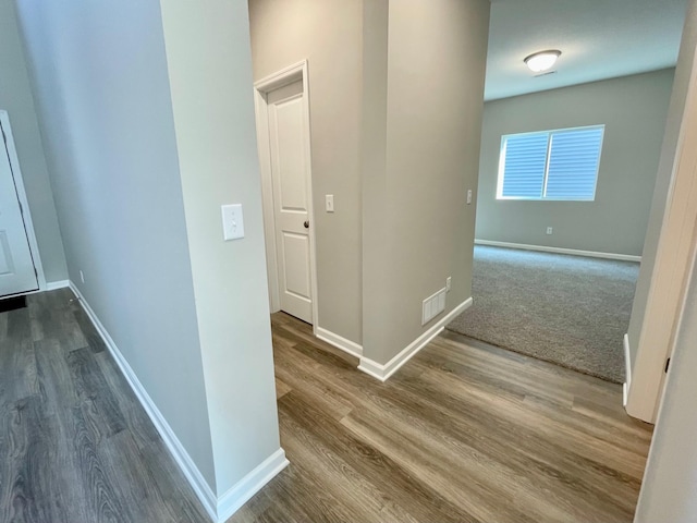 3228 Kady Ave NE, Saint Michael, MN 55376 - corridor featuring baseboards and wood finished floors