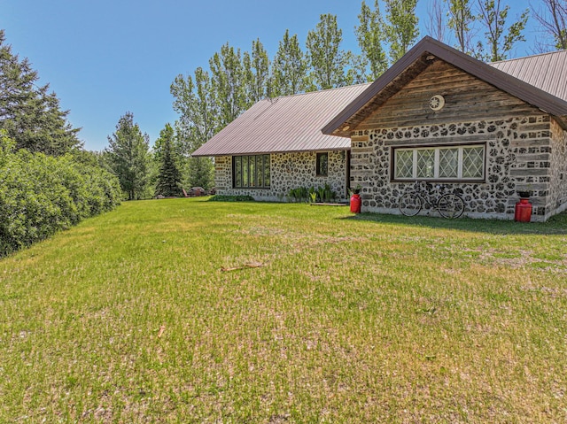 12926 Daisy Ln SW, Farwell, MN 56327 - view of front of house featuring metal roof, a front yard, and stone siding
