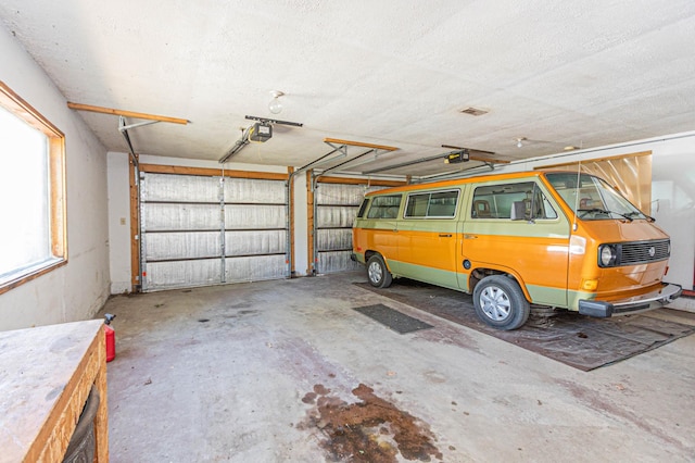 12926 Daisy Ln SW, Farwell, MN 56327 - garage featuring a garage door opener