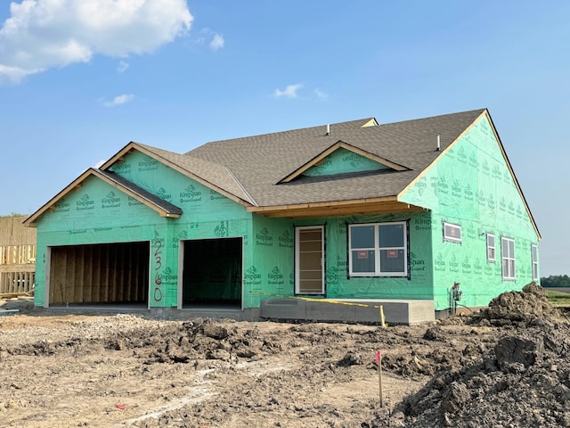 2360 Jandell Ave NE, Saint Michael, MN 55376 - unfinished property with roof with shingles and an attached garage