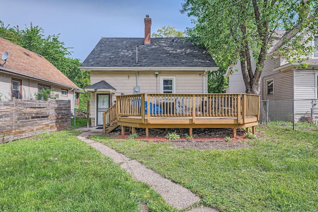 900 Charles Ave, Saint Paul, MN 55104 - back of property with a deck and a chimney