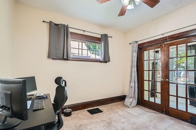 900 Charles Ave, Saint Paul, MN 55104 - carpeted office space with french doors, ceiling fan, and baseboards