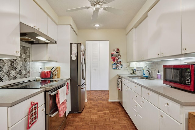 4360 Brookside Ct Unit 305, Edina, MN 55436 - kitchen featuring stainless steel appliances, under cabinet range hood, a ceiling fan, light countertops, and white cabinets