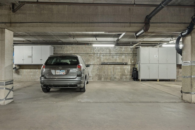 4360 Brookside Ct Unit 305, Edina, MN 55436 - parking deck featuring concrete block wall