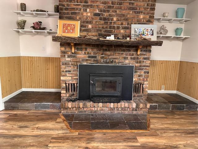 22 Cottonwood Ct, Babbitt, MN 55706 - detailed view of wood finished floors, wainscoting, wooden walls, and baseboards