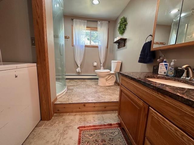 22 Cottonwood Ct, Babbitt, MN 55706 - full bathroom with washer / dryer, vanity, a shower, toilet, and tile patterned flooring