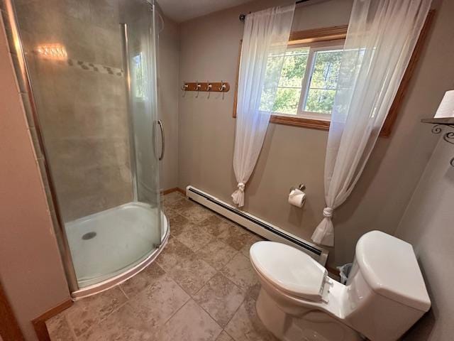 22 Cottonwood Ct, Babbitt, MN 55706 - full bath with toilet, a shower stall, baseboards, and a baseboard heating unit