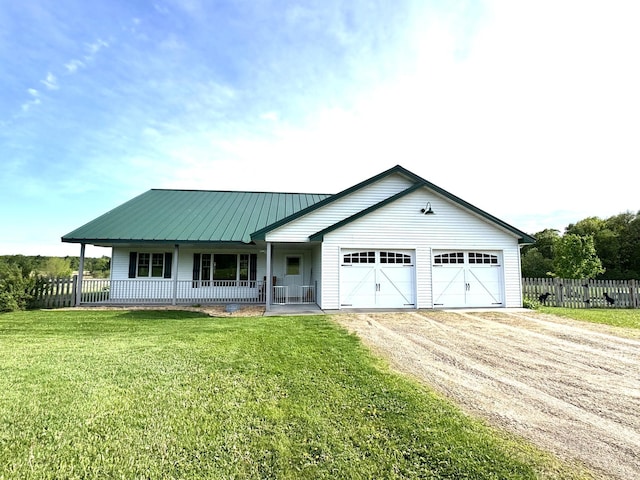 2563 125th Ave, Braham, MN 55006 - view of front facade with dirt driveway, covered porch, and an attached garage