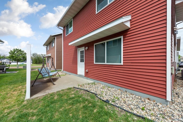 105 Owl Path, Mankato, MN 56001 - view of side of home with a yard and a patio