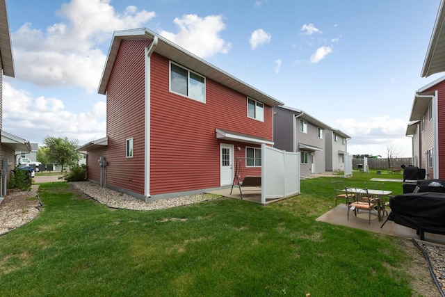 105 Owl Path, Mankato, MN 56001 - rear view of property with a patio and a lawn